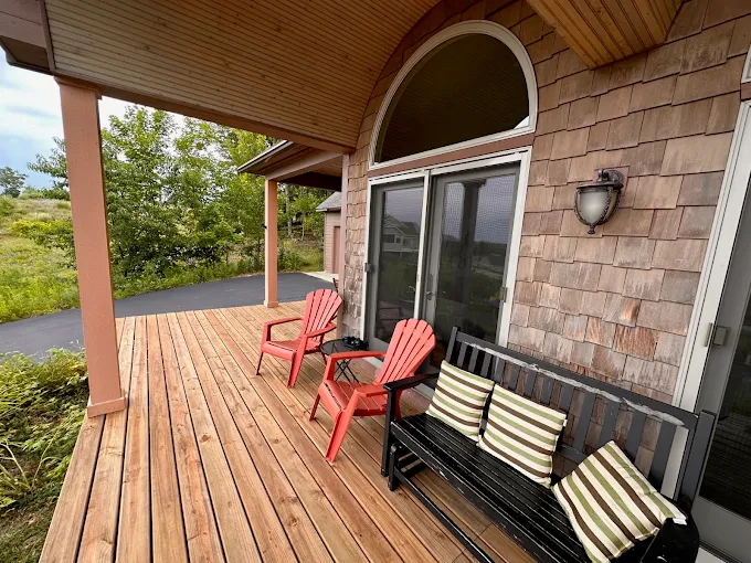Home addition and deck construction in Maple City, Michigan